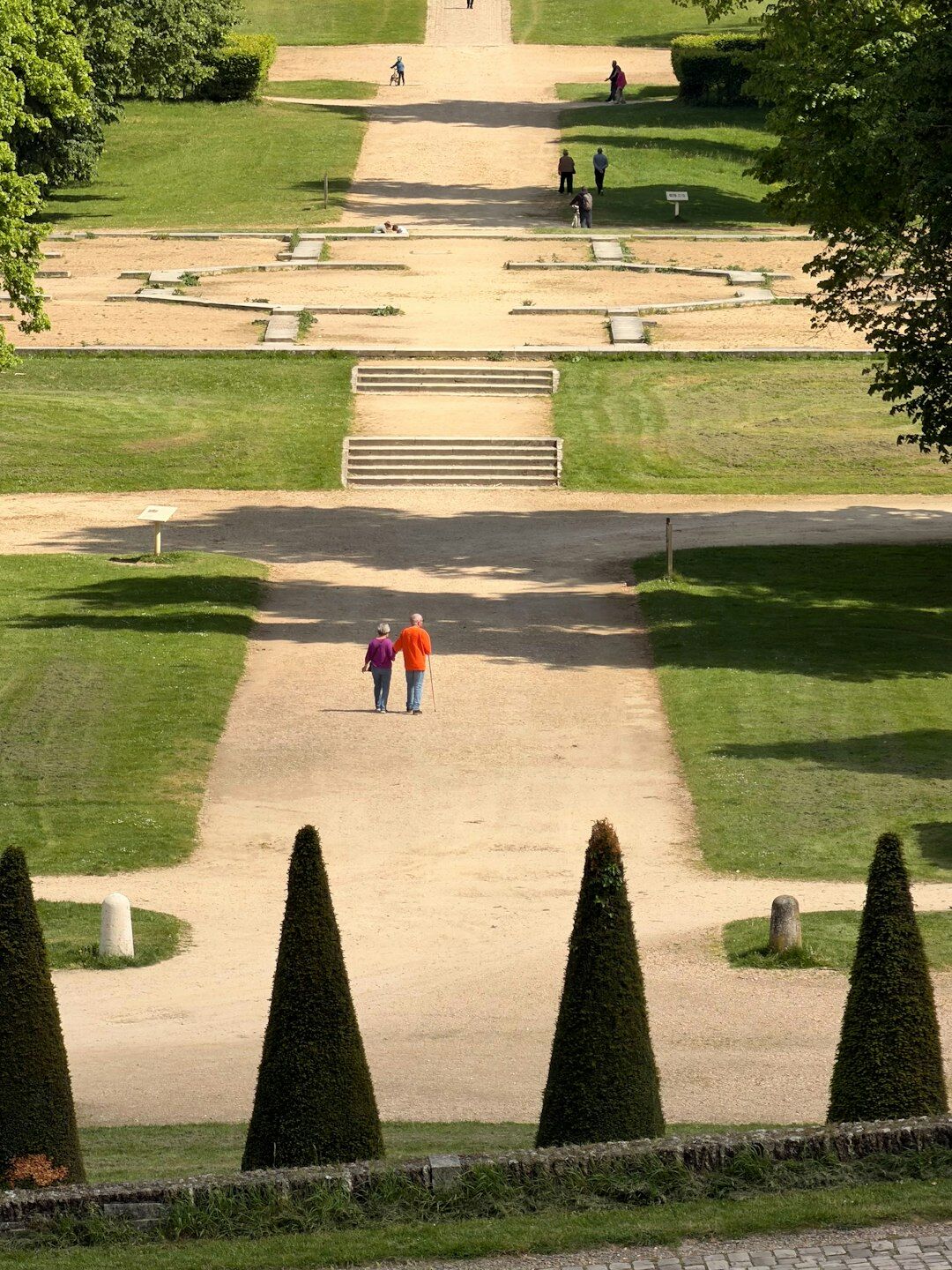 senior couple walking in park