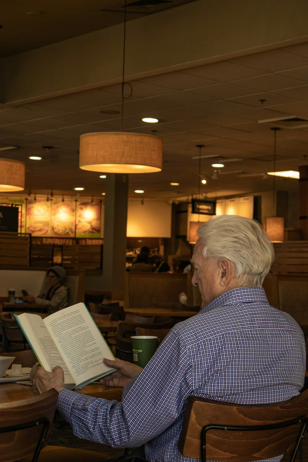senior man reading book