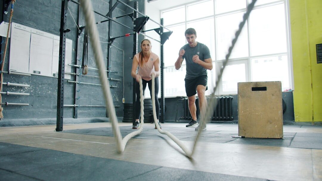 elderly people exercising in gym