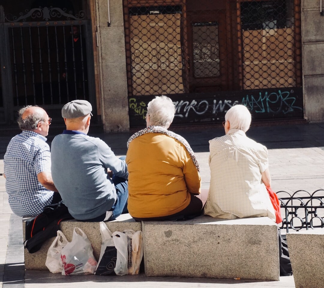 group of elderly friends chatting
